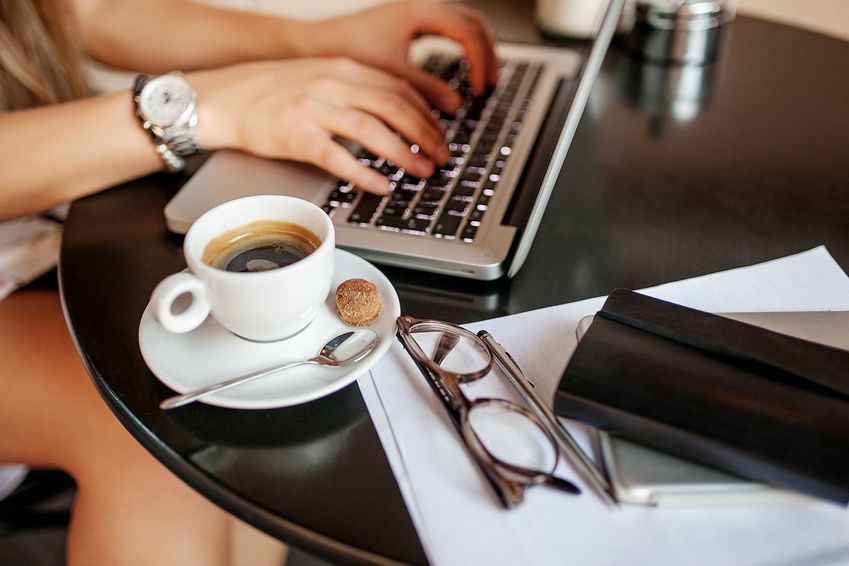 Young business woman in cafe